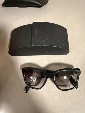 Prada Black Cat-Eye Sunglasses with Gradient Lenses